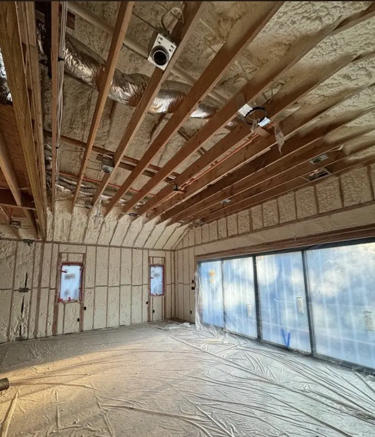 Interior walls and ceiling insulated with spray foam during new construction in Laplace